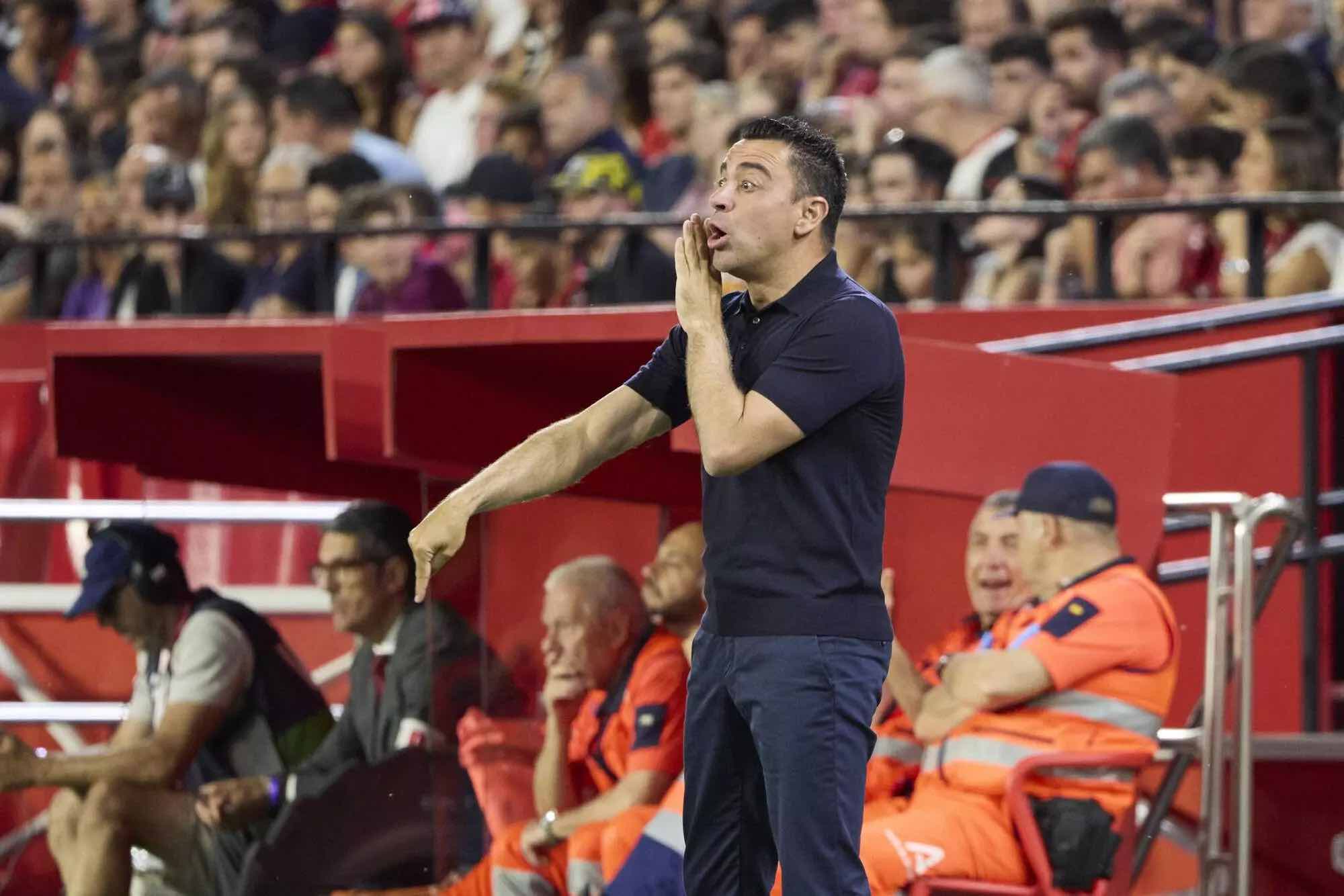 تشافي هيرنانديز لاعب ومدرب برشلونة السابق